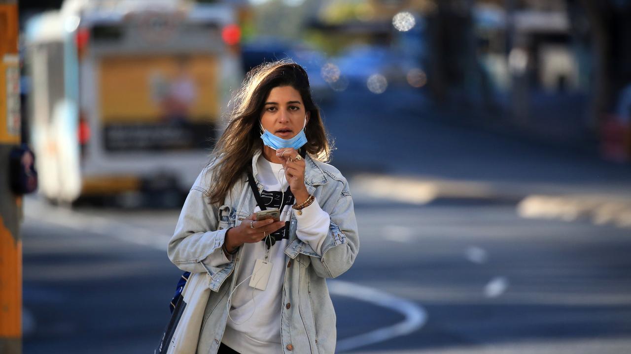 A woman with a mask in Sydney last year. Picture: NCA NewsWire / Christian Gilles