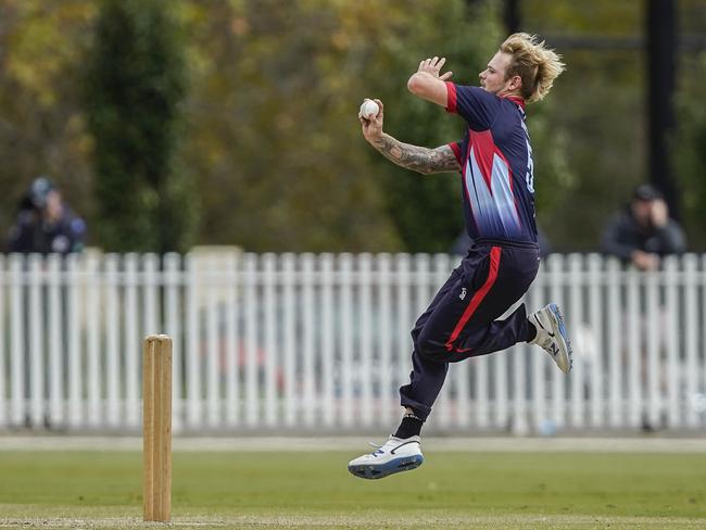 Jack Fowler bowling for Dandenong in the grand final. Picture: Valeriu Campan