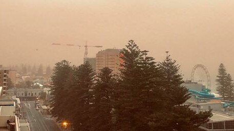 Smoke haze from the bushfires seen over Glenelg. Picture: Nick Andrew