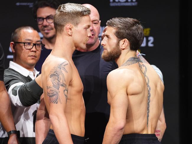 SYDNEY, AUSTRALIA - FEBRUARY 07: (L-R) Opponents Colby Thicknesse of Australia and Aleksandre Topuria of Germany face off during the UFC 312 ceremonial weigh-in at Qudos Bank Arena on February 07, 2025 in Sydney, Australia. (Photo by Jeff Bottari/Zuffa LLC)