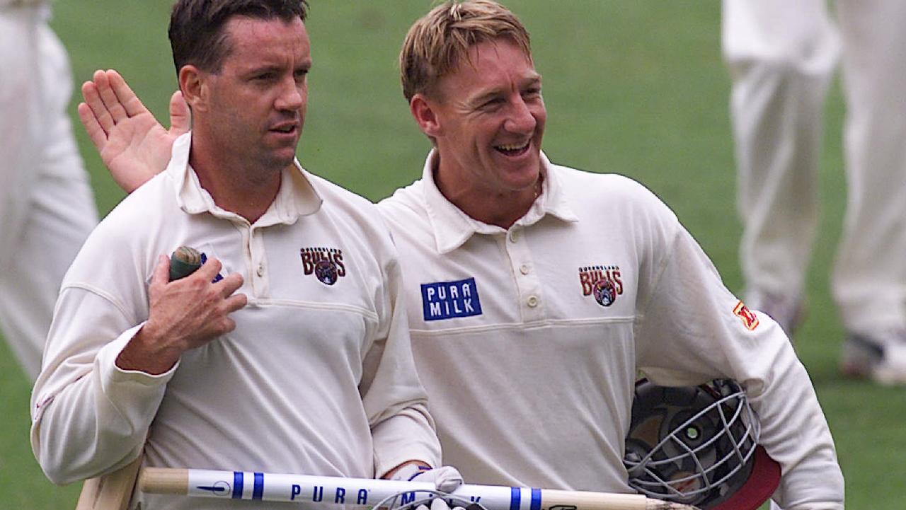 Stuart Law and Andy Bichel after batting Queensland to another Shield (Pura Cup) title.