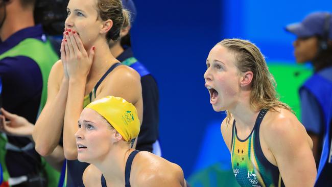 Bronte Barratt (R) cheers on Tamsin Cook during the women’s 4x200m freestyle relay. Picture: Alex Coppel.