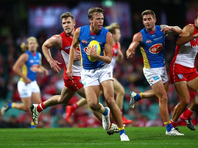 Jack Lukosius of the Suns runs the ball during the round 15 AFL match between the Sydney Swans and the Gold Coast Suns at Sydney Cricket Ground on June 29, 2019 in Sydney, Australia. (Photo by Cameron Spencer/AFL Photos via Getty Images)