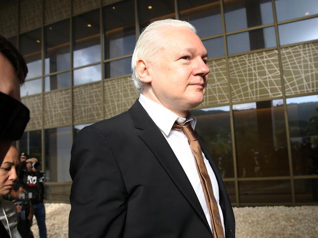 Julian Assange outside court in Saipan. Picture: Getty Images