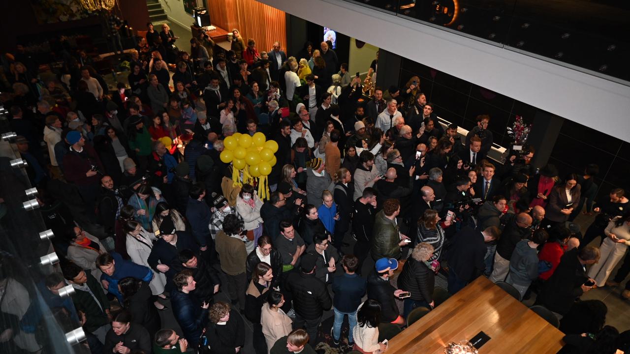 The small conference room was full of hundreds of journalists from Australia and across the world, as well as supporters. Picture: NewsWire/ Martin Ollman