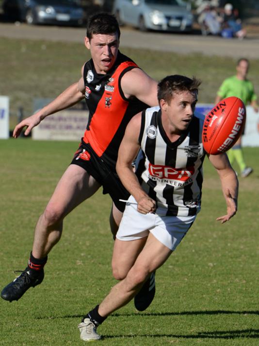 Josh Donohue, of Payneham Norwood Union, takes on Tea Tree Gully at Pertaringa Oval on Saturday. Picture: Supplied.