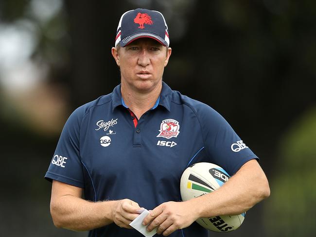 Roosters coach Trent Robinson watches on during a training session.