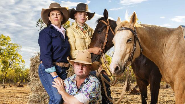 Kate and Tick Everett with their eldest daughter Meg and their horses at home on the family property near Katherine. Picture: Lachie Millard