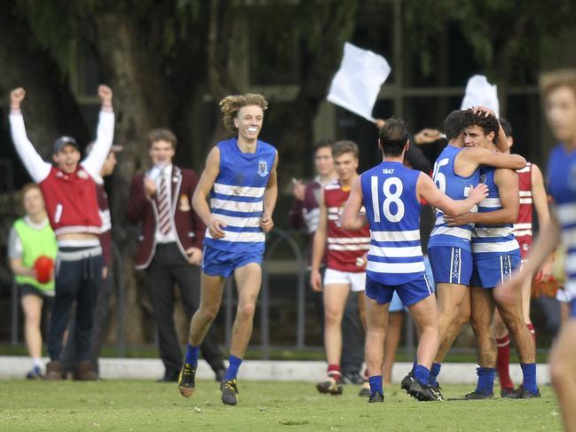 St Peter’s players celebrate a late goal during their heavy loss to fierce rival Prince Alfred. Picture: AAP/Dean Martin