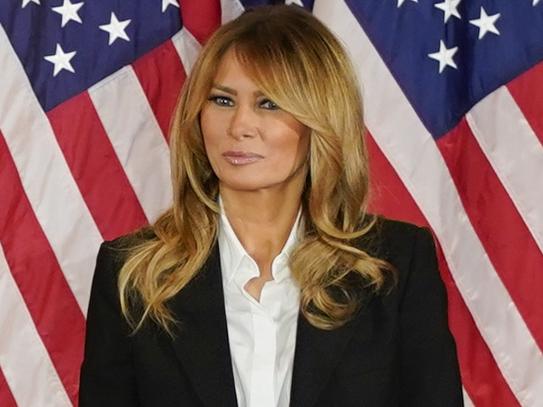 U.S. President Donald Trump gestures after speaking during an election night party with U.S. First Lady Melania Trump, right, in the East Room of the White House in Washington, D.C., U.S., on Wednesday, Nov. 4, 2020. Trump declared he had won re-election against Joe Biden and said he would ask the Supreme Court to intervene, even as several battleground states continue to count votes. Photographer: Al Drago/Bloomberg via Getty Images