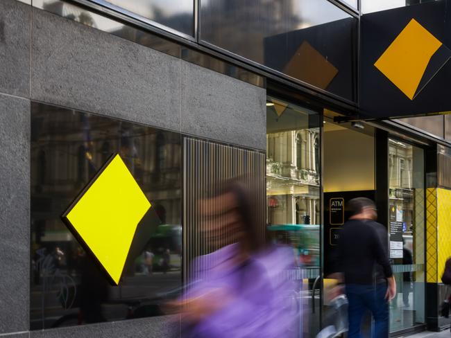 MELBOURNE, AUSTRALIA - MAY 03: People are seen walking past a Commonwealth Bank of Australia branch on May 03, 2022 in Melbourne, Australia. The Reserve Bank of Australia has today lifted the official interest rate to 0.35 per cent following a meeting today. The rise is the first interest rate increase since November 2010. (Photo by Asanka Ratnayake/Getty Images)