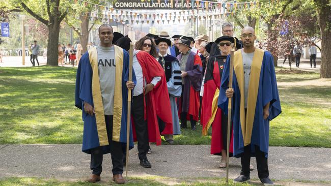 Students and staff at ANU in a graduation parade last year. The university will cease teaching for one week to shift courses online to combat the coronavirus. Photo: Lannon Harley