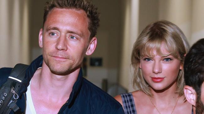 Taylor Swift and Tom Hiddleston arrive at Sydney International l Airport before being transferred to the Gold Coast. Picture Cameron Richardson.