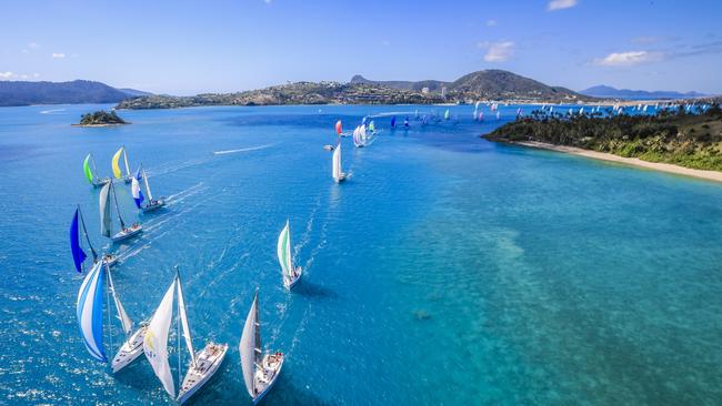 A flotilla of yachts competes in a race at this year’s annual Hamilton Island Race Week. Picture: Salty Dingo