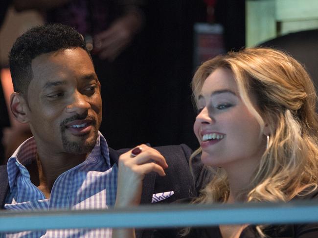 Margot Robbie and Will Smith in a scene from the movie Focus.