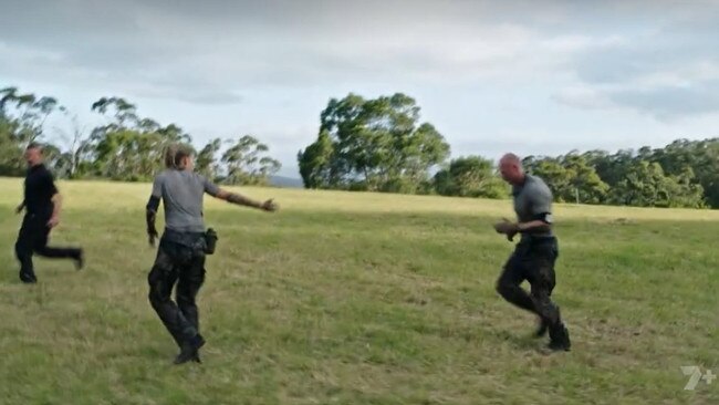 Heinrich slowed down to encourage Hall. Picture: Channel 7