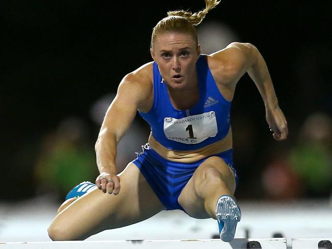 Sally Pearson competes in the women's 100 metre hurdles during the Jandakot Airport Perth Track Classic at WA.