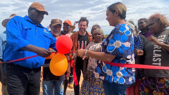 Central Desert Regional Council president Adrian Nixon and Essential Services Minister Selena Uibo cut the ceremonial ribbon at the opening of the Laramba water treatment plant. Picture: Supplied.