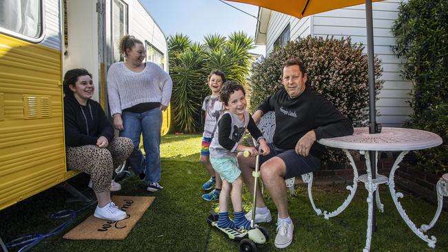 Marc Jefferies at his home with his kids, from left, Matilda, who is in Grade 6, Charli who is in Year 11, Oscar, who is in prep, and Billy. Picture: Aaron Francis