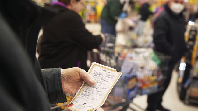 <s1>RESTRICTIONS: Hard to get everything at the regular fortnightly shop.</s1> <source> Picture: AP</source>