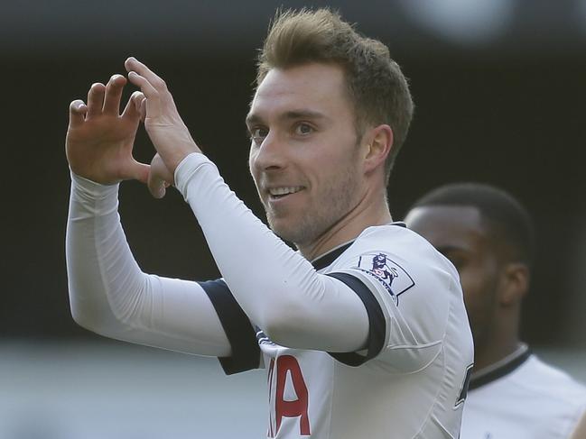 Tottenham’s Christian Eriksen, centre, celebrates after scoring a goal during the English Premier League soccer match between Tottenham Hotspur and Sunderland at White Hart Lane in London, Saturday Jan. 16, 2016. (AP Photo/Tim Ireland)