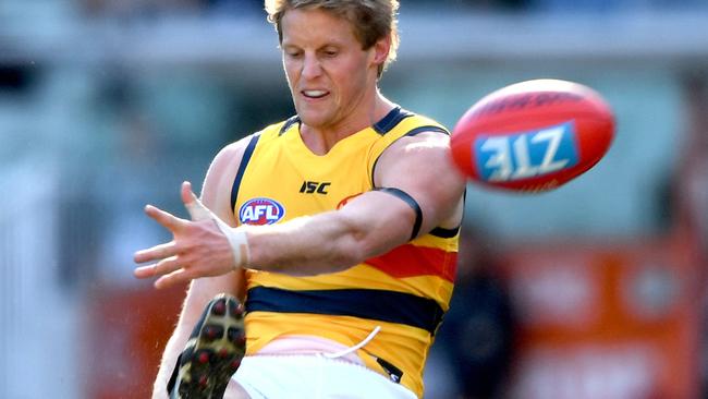 Rory Sloane of the Crows kicks at goal against Carlton. Picture: Joe Castro (AAP)