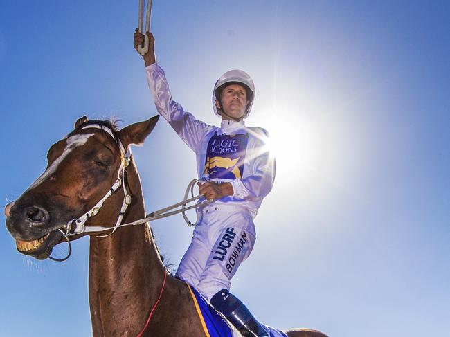 Magic Millions horses on the beach at Surfers Paradise for the barrier draw and Commonwealth Games baton relay arrival.Champion jockey Hugh Bowman, carrying the QueenÕs Baton.Picture: NIGEL HALLETT