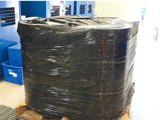 A timber pallet containing four covered metal drums containing butanediol and a viscous liquid that Scott Alexander Edwards agreed to transport from South Australia to Melbourne.