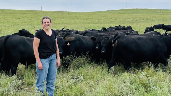 Lilli Stewart with Angus cattle at Dalebanks Ranch in the southern Flint Hills of Kansas.