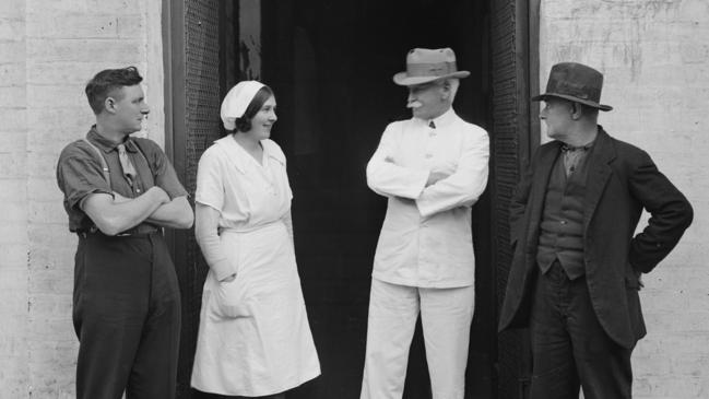 Macpherson Robertson being welcomed home by staff at his Fitzroy factory for MacRobertson's chocolate in 1935. Picture: State Library of Victoria.