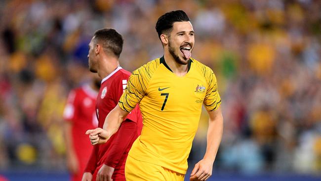 Mathew Leckie of the Socceroos celebrates after scoring a goal during the International friendly match between Australia and Lebanon at ANZ Stadium in Sydney, Tuesday, November 20, 2018. (AAP Image/Dan Himbrechts) NO ARCHIVING, EDITORIAL USE ONLY