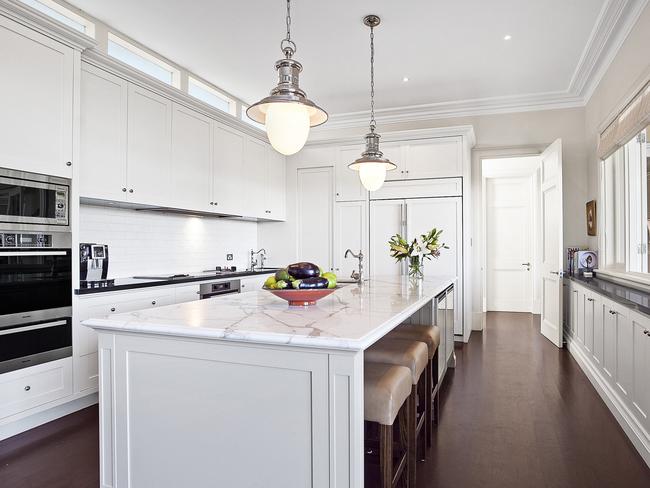 The marble island kitchen comes complete with a butler’s pantry and wine cellar.