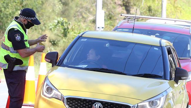 Police stopping cars at Coolangatta. Picture: Richard Gosling