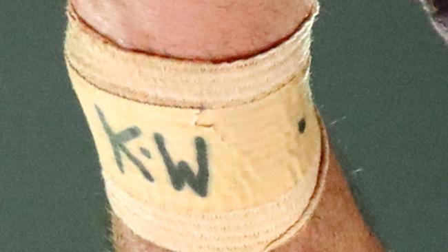 The initials K.W. written on the strapping of Darius Boyd. Photo: Getty Images