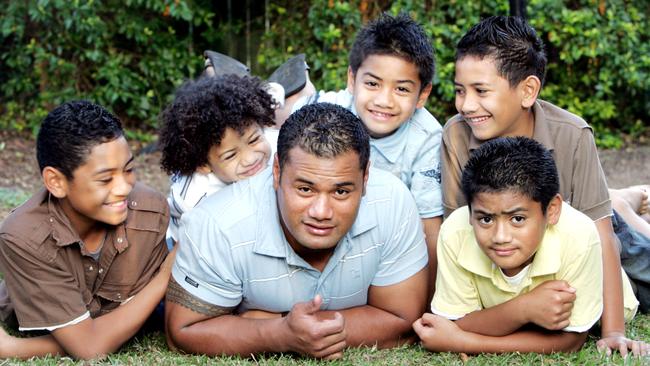 Former Queensland Reds Prop Ernest Skelton pictured in 2006 with his sons.