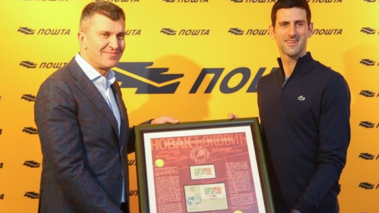 According to his Instagram page Djokovic was accepting his own Serbian stamp a day after testing positive