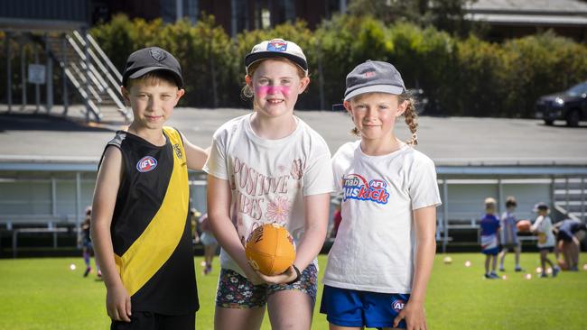 Tasmania AFL Club Clinic, Mason Cane 8, Mavis Bester 8 and Alice Kennedy 8 at North Hobart Oval. Picture: Chris Kidd