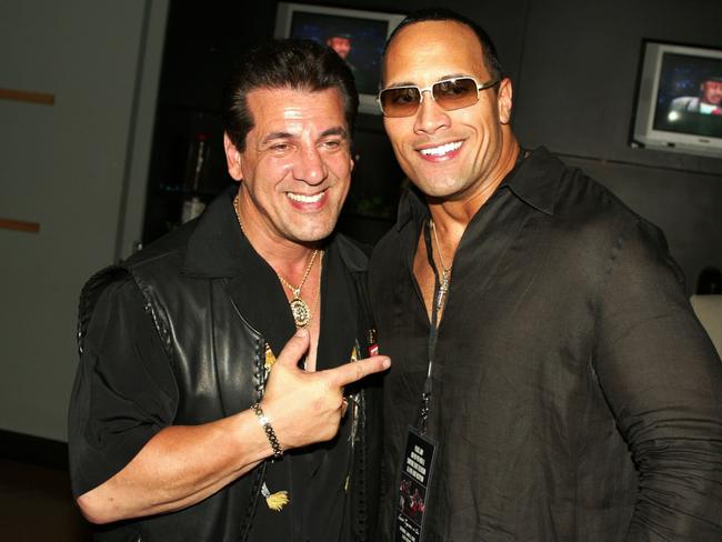 Former bikie Chuck Zito, with A-lister The Rock in 2002, moved into acting and stunt work. Picture: ImageDirect