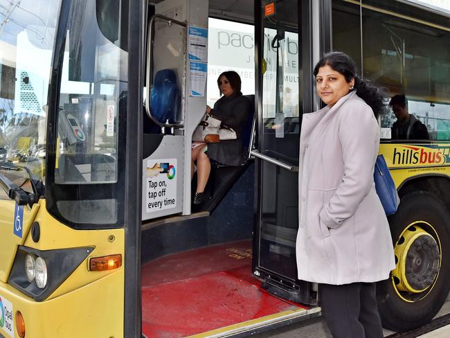 Bus commuter Dineesha Dronavalli waits for her bus at the Burns T-Way at Kellyville on Monday June 18th. She is unhappy Opal fares are about to rise, meaning that the Hills only form of public transport will become more expensive. (AAP IMAGE / Troy Snook)