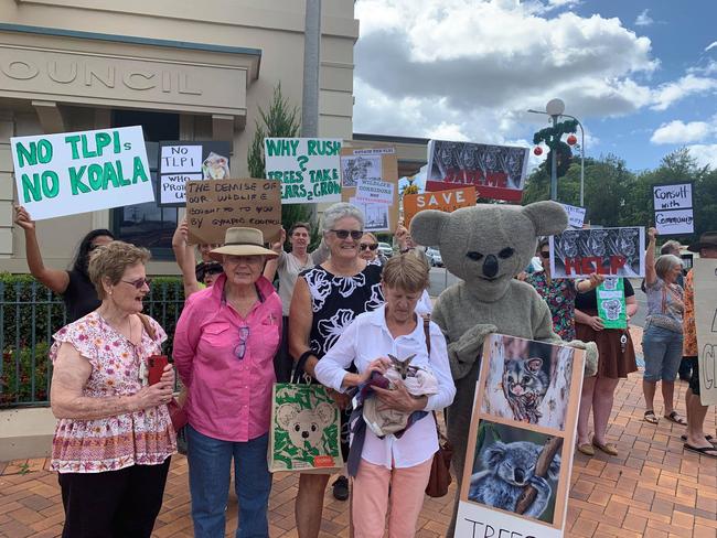 Protesters outside Gympie's Town Hall this morning fight against council's plan to pull back on environmental protections that limits subdivisions on the Southside.Pictures: Kristen Camp