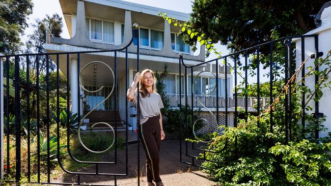 Beth Phillips outside Saade House in Black Rock, which she bought to restore and renovate in sympathy with its 1970s origins. Picture: Aaron Francis.