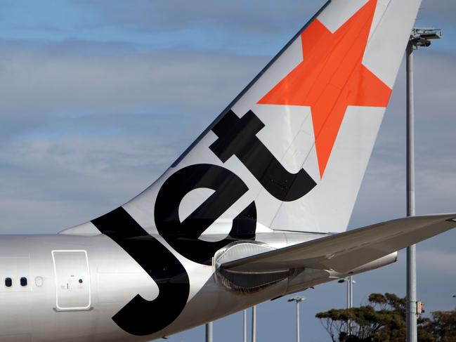 Generic Jetstar aircraft at Sydney airport. Jet star, plane.