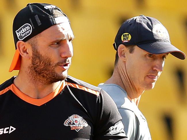 Robbie Farah and coach Jason Taylor during a Wests Tigers training session at Concord Oval,Concord. Picture : Gregg Porteous