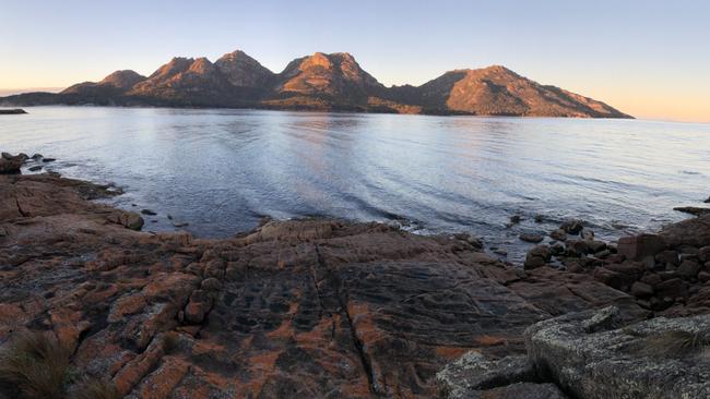 Sun breaks on the Hazards at Coles Bay Freycinet Peninsula Tasmania. Picture: PHIL YOUNG