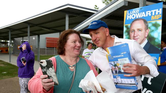 Federal LNP MP for Petrie Luke Howarth at Mango Hill State school polling booth, on Saturday. Picture AAP/ David Clark