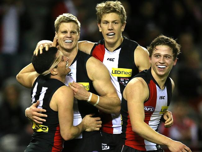 Nick Riewoldt, is mobbed by Leigh Montagna, Rhys Stanley and Jack Billings. Picture: Wayne Ludbey