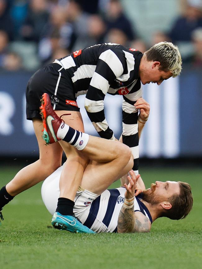 Jack Ginnivan and Zach Tuohy get to know each other. Picture: Michael Willson/AFL Photos via Getty Images