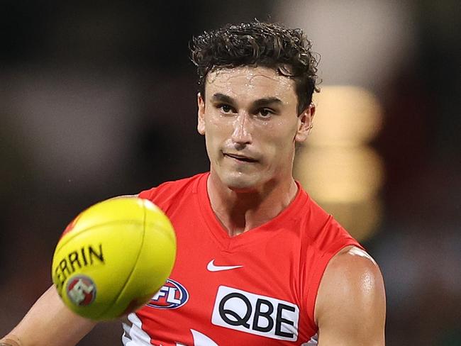 SYDNEY, AUSTRALIA - MARCH 23: Sam Wicks of the Swans kicsk during the round two AFL match between Sydney Swans and Essendon Bombers at SCG, on March 23, 2024, in Sydney, Australia. (Photo by Mark Metcalfe/AFL Photos/via Getty Images )