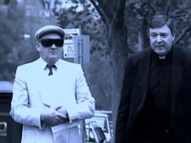 Gerald Ridsdale (left) arriving to court with George Pell