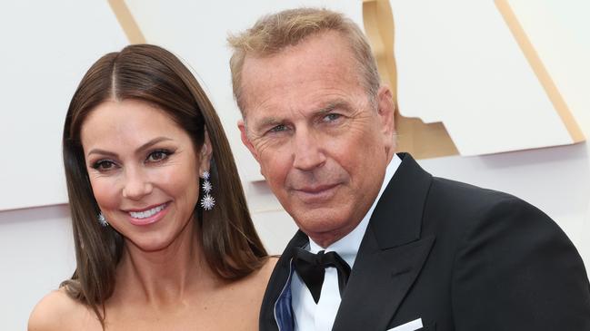 Christine Baumgartner and Kevin Costner attend the 94th Annual Academy Awards in 2022. Picture: David Livingston/Getty Images